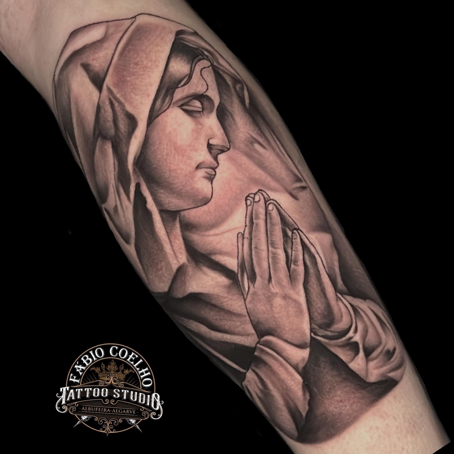 Praying hands and Madonna in black and grey
